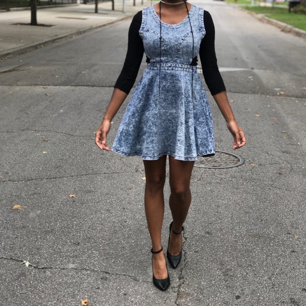Acid wash jean jumpsuit with flare skirt
